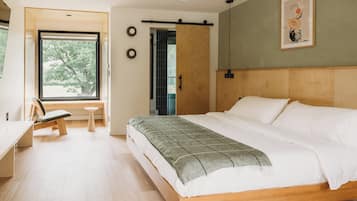 Premium bedding, memory foam beds, desk, laptop workspace