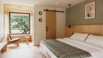 Premium bedding, memory foam beds, desk, laptop workspace