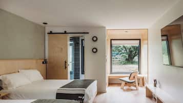 Premium bedding, memory foam beds, desk, laptop workspace