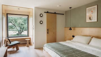 Premium bedding, memory foam beds, desk, laptop workspace