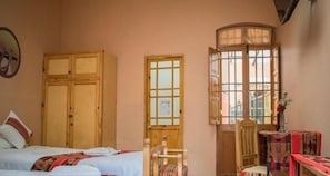 Family Duplex, Multiple Beds | 1 bedroom, down comforters, individually decorated