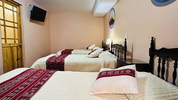 Triple Room, 3 Twin Beds, Courtyard View | Down comforters, individually decorated, individually furnished