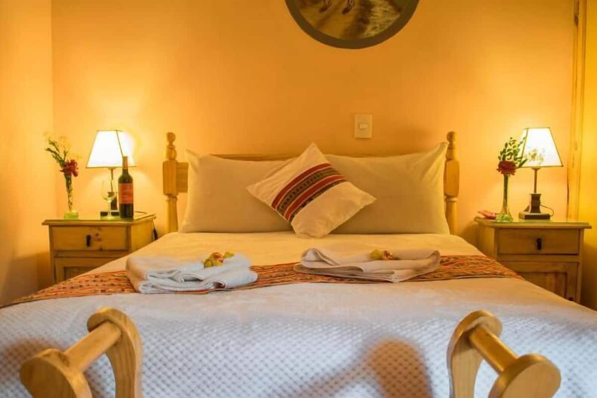 Double Room, 1 Queen Bed | 1 bedroom, down comforters, individually decorated