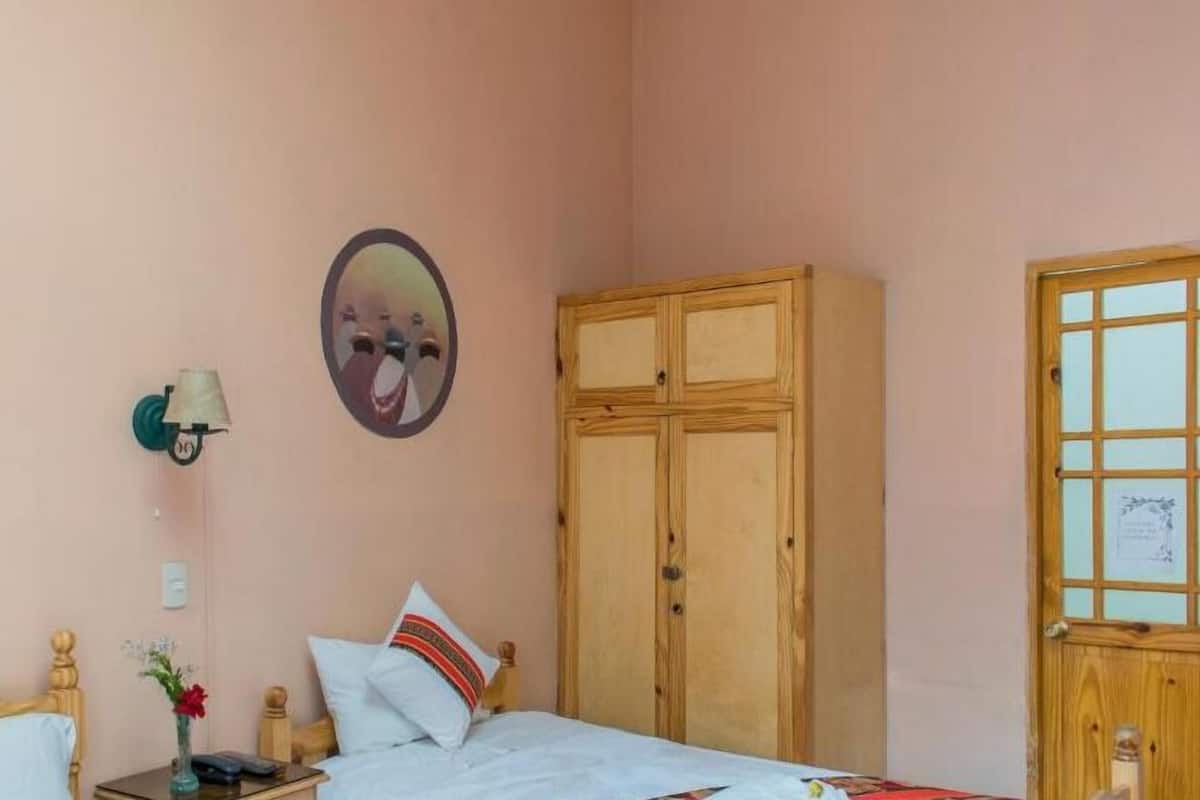 Family Duplex, Multiple Beds | 1 bedroom, down comforters, individually decorated