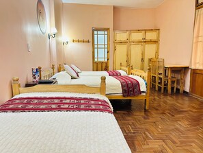 Quadruple Room, Multiple Beds | Down duvets, individually decorated, individually furnished - La Posada de la Abuela Obdulia (La Paz)