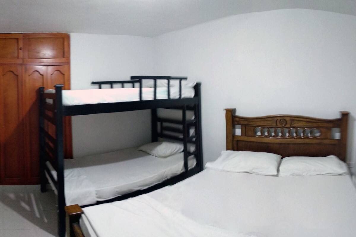 Blackout curtains, iron/ironing board, free WiFi, bed sheets
