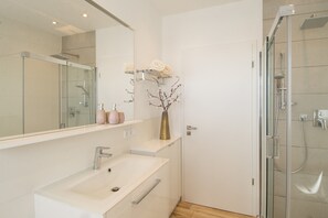 Bathtub, hair dryer, towels