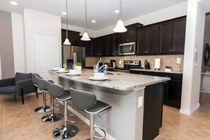 Fridge, microwave, oven, stovetop - 5BR Home w/ Pool - Windsor at Westside (8890GC) (Kissimmee)