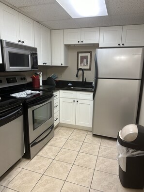 Fridge, microwave, dishwasher, coffee/tea maker