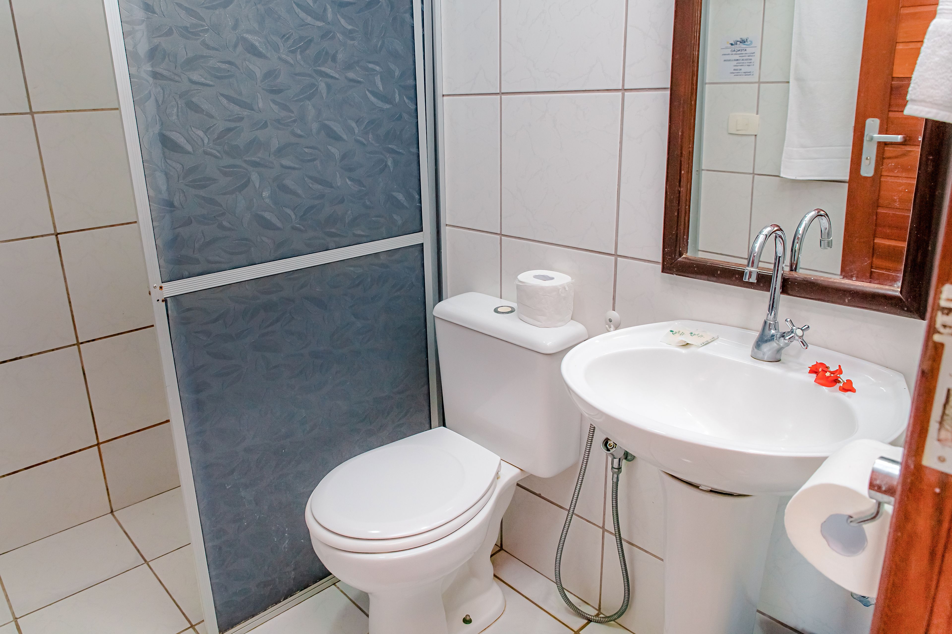 deluxe triple room, sea facing | bathroom | shower, towels, soap, toilet paper