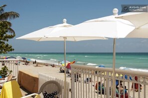 On the beach, sun-loungers, beach towels