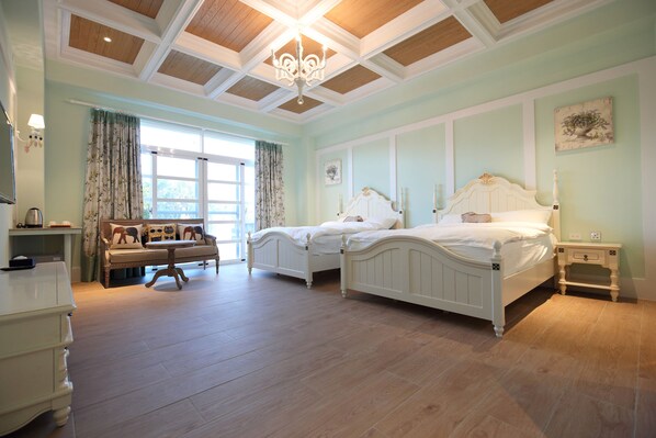 A bedroom with two white beds, a wooden floor, a bench, and a chandelier. - Serrado Manor (Ji'an)