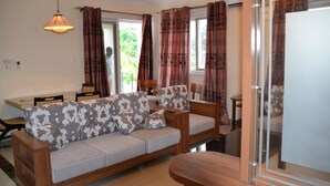 Basic Apartment | Living area | Flat-screen TV - Sea Breeze Residential Complex (Dar es Salaam)