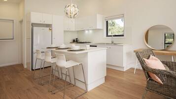 Design Chalet, 2 Bedrooms | Private kitchen | Full-size fridge, microwave, oven, stovetop