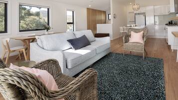 Design Chalet, 2 Bedrooms | Living area | Flat-screen TV