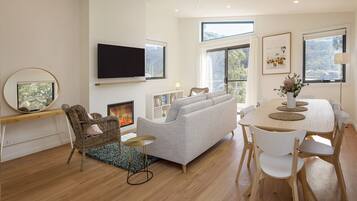 Design Chalet, 2 Bedrooms | Living area | Flat-screen TV
