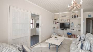 Comfort House, 3 Bedrooms | Living area | Flat-screen TV