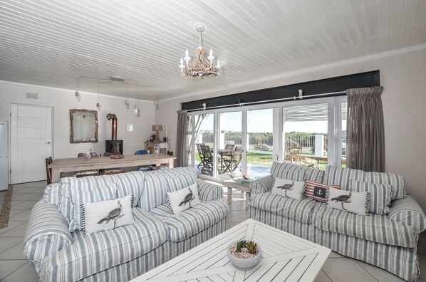 Comfort House, 3 Bedrooms | Living area | Flat-screen TV - 9 on Dolfyn (Yzerfontein)