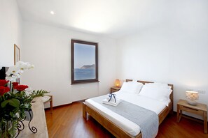 Habitación doble superior, vistas al mar | Edredones de plumas, colchones viscoelásticos, caja fuerte
