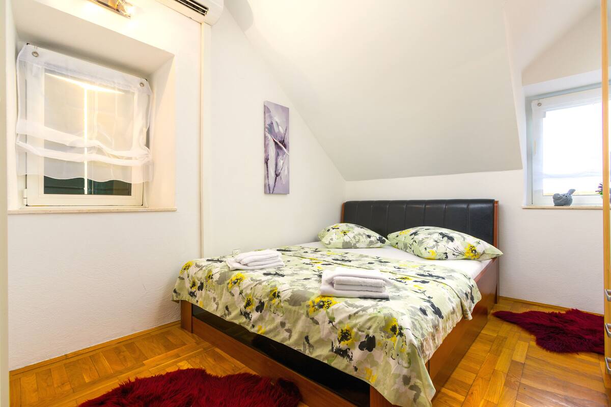 Premium bedding, memory-foam beds, blackout curtains, soundproofing