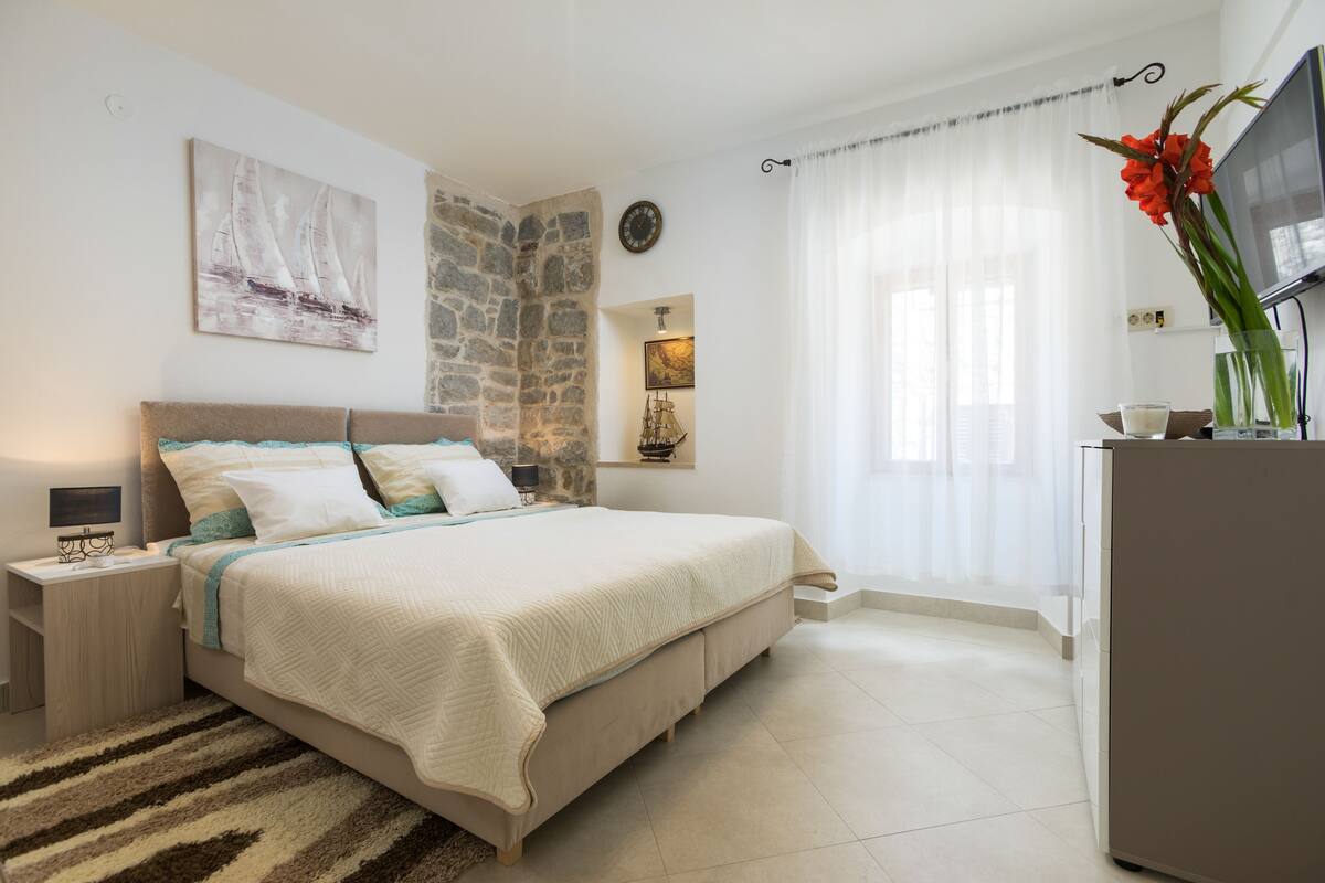 Premium bedding, memory-foam beds, blackout curtains, soundproofing