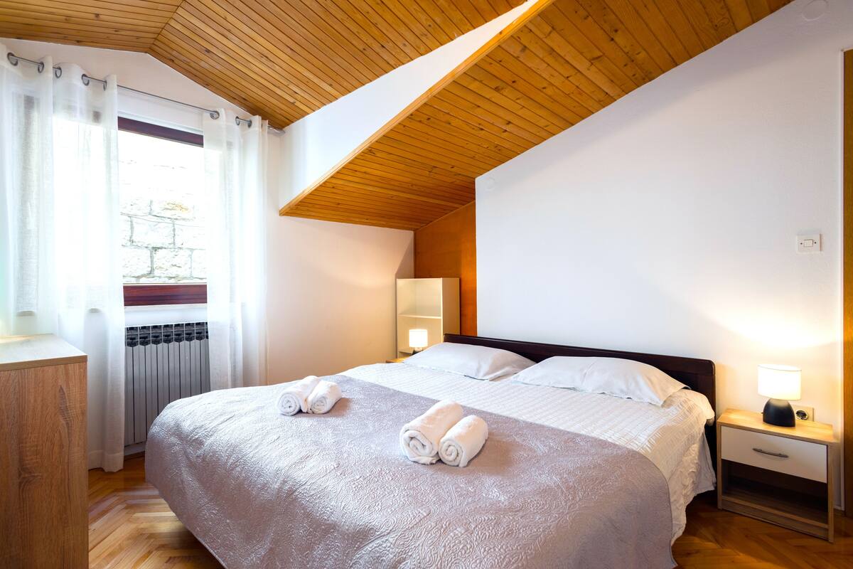 Premium bedding, memory-foam beds, blackout curtains, soundproofing