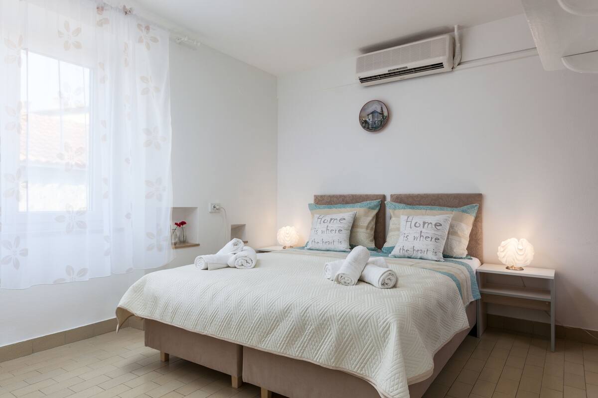Premium bedding, memory-foam beds, blackout curtains, soundproofing