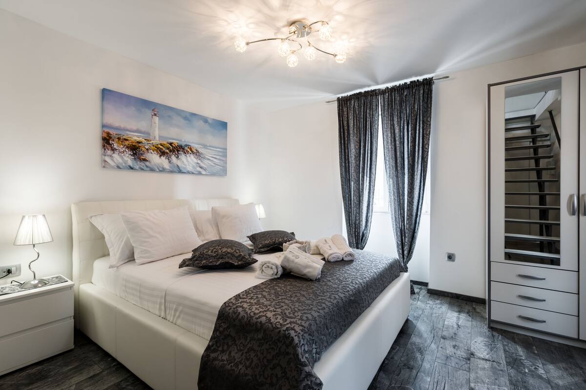 Premium bedding, memory-foam beds, blackout curtains, soundproofing
