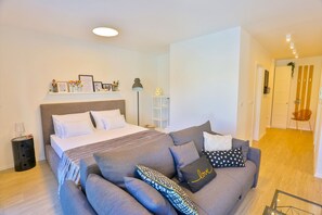 Deluxe Apartment, Multiple Beds, Sea View | Premium bedding, memory-foam beds, in-room safe, soundproofing