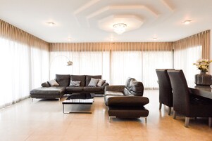 Comfort Villa, 4 Bedrooms, Beach View | Living area | Flat-screen TV