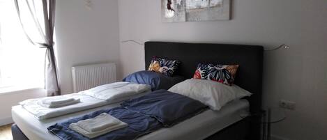Standard Apartment, 1 Queen Bed, City View | Iron/ironing board, free WiFi, bed sheets