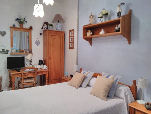 Desk, blackout curtains, free cots/infant beds, free WiFi