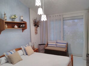 Desk, blackout curtains, free cots/infant beds, free WiFi