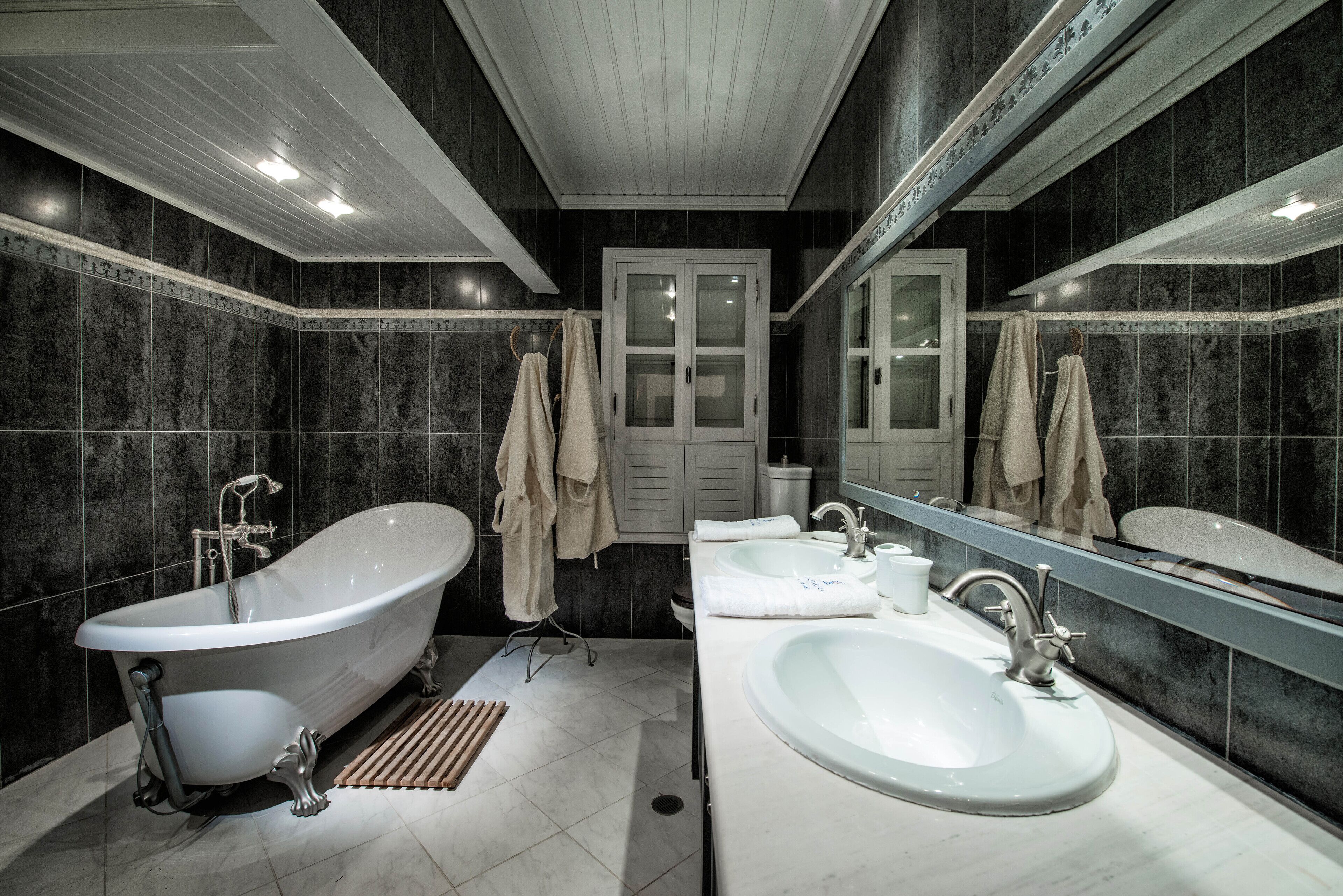 Rainfall showerhead, designer toiletries, hair dryer, bathrobes