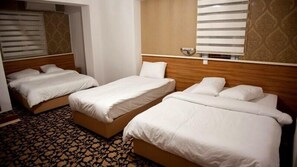 Kamar Triple | Wi-Fi gratis dan seprai linen