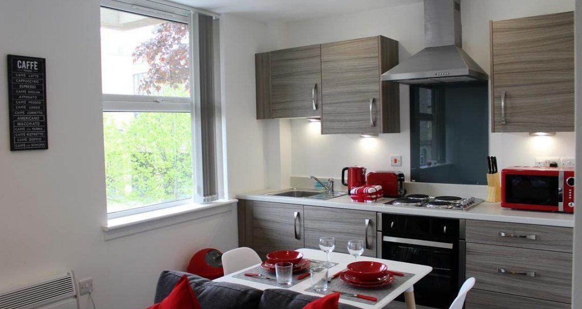 Apartment (Ground Floor) | Private kitchen | Full-size fridge, microwave, oven, stovetop