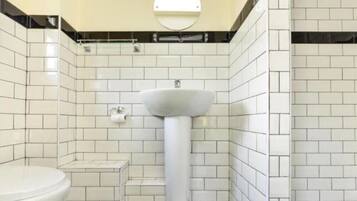 Holiday Home | Bathroom | Combined shower/tub, hair dryer, towels