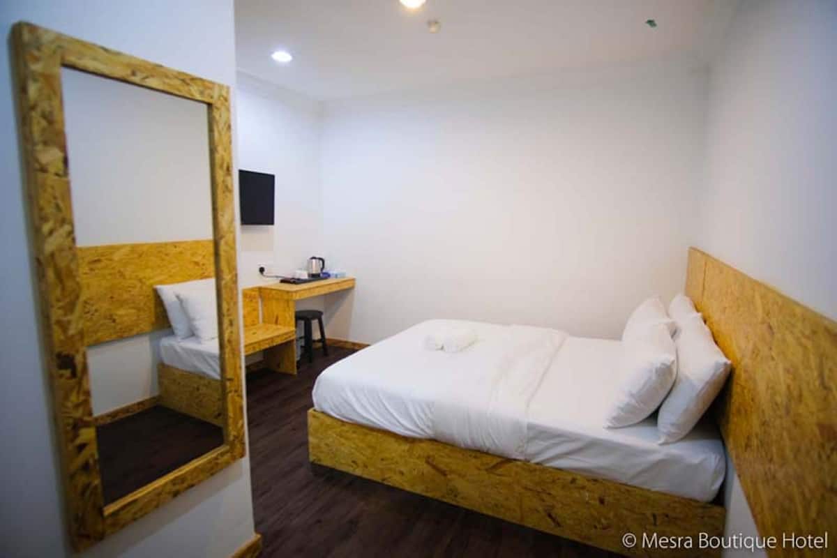 Desk, blackout curtains, iron/ironing board (on request), free WiFi