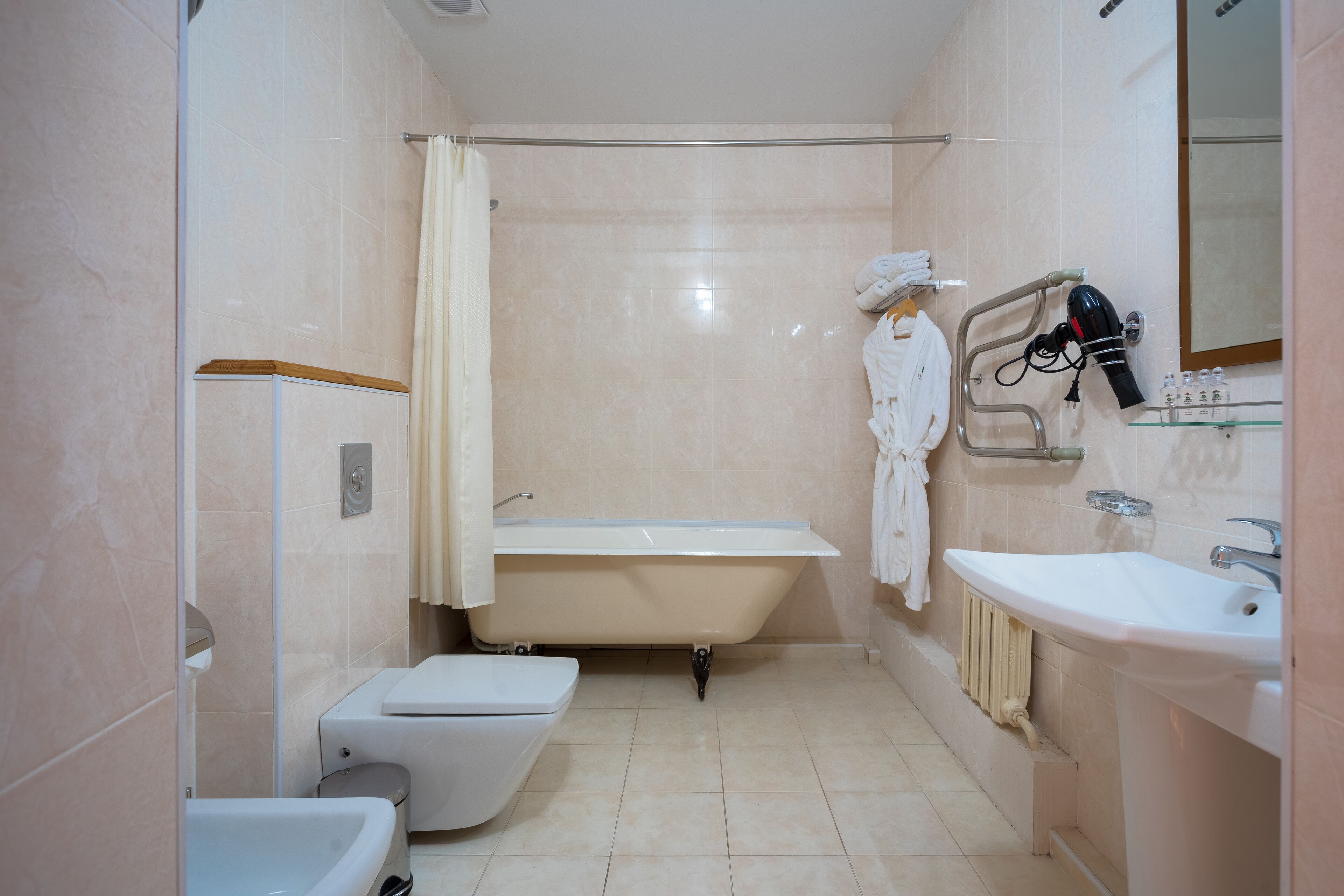 bathtub, free toiletries, hair dryer, bathrobes