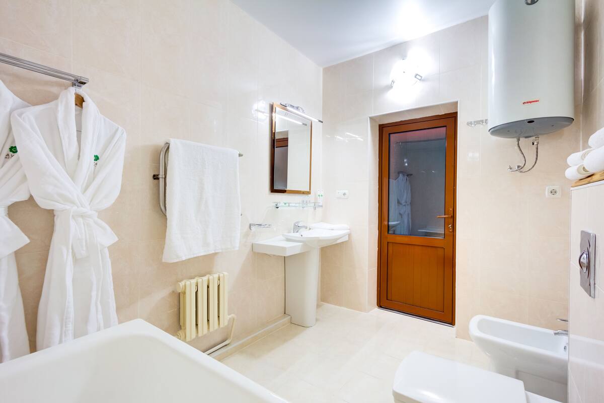 bathtub, free toiletries, hair dryer, bathrobes