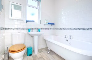 Three-Bedroom House | Bathroom | Combined shower/tub, hair dryer, towels