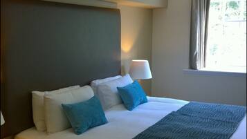 Blackout curtains, iron/ironing board, cots/infant beds, bed sheets