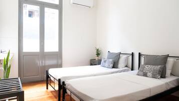 Gemeinsamer Schlafsaal, 2 Einzelbetten | Kostenlose Babybetten, kostenloses WLAN, Bettwäsche