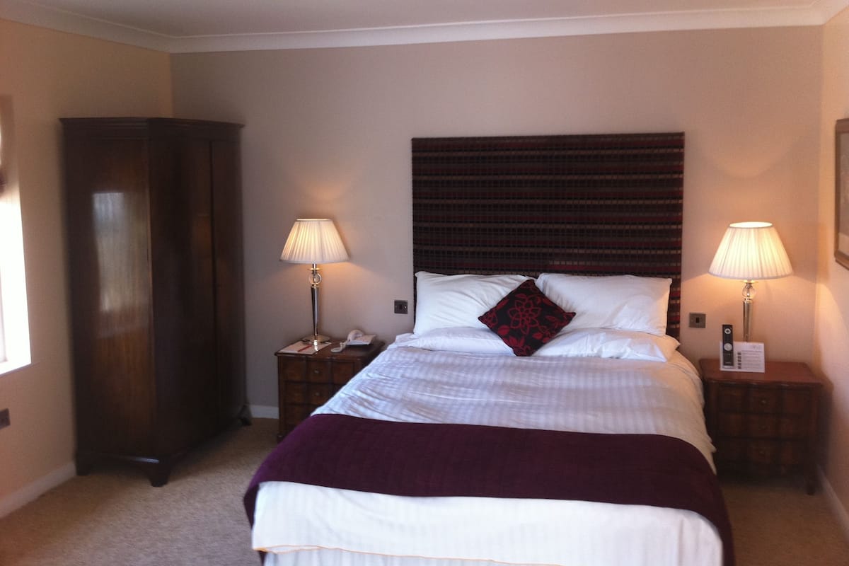 Suite | Individually decorated, individually furnished, desk, laptop workspace