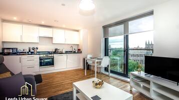 Apartment (500) | Living area | Flat-screen TV