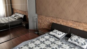 Apartamento luxo, 2 quartos | Área de estar