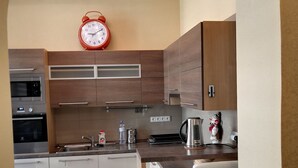 Apartamento luxo, 2 quartos | Cozinha privada