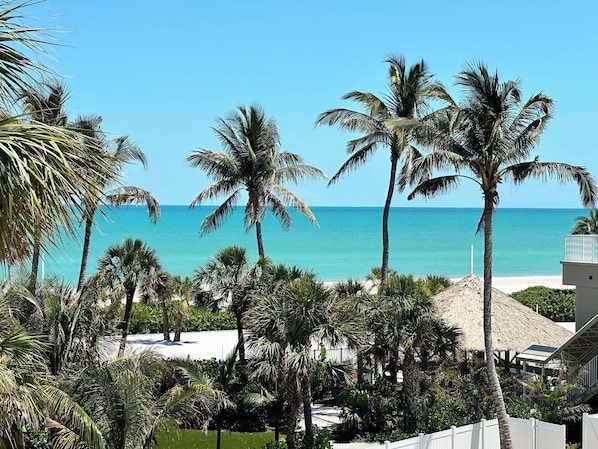 On the beach, sun-loungers, beach towels
