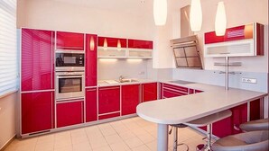 Design Apartment, 1 King Bed, City View | Private kitchen | Oven, stovetop, dishwasher, electric kettle - Alice (Prague)