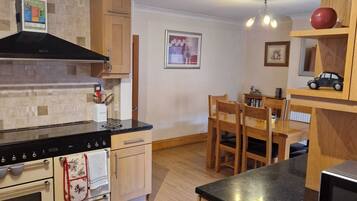 House, Multiple Beds | Private kitchen | Full-sized fridge, microwave, oven, stovetop